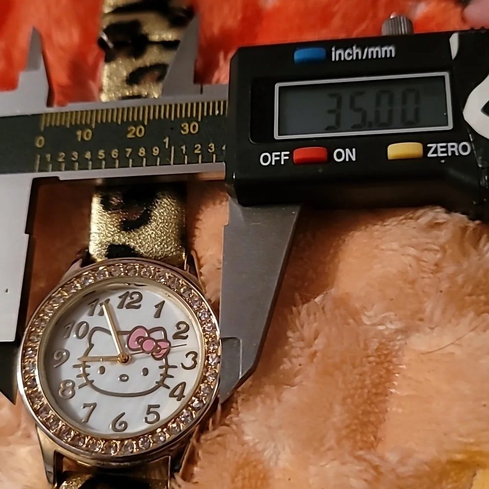 Sanrio Hello Kitty Gold Crystal Studded Bezel Leopard Print Band Textured Face‎